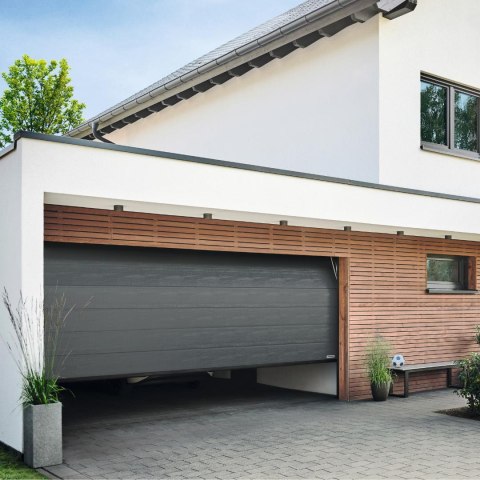 Brama garażowa segmentowa Renomatic/Hormann z napędem Supramatic E i szyną FS10-K - przetłoczenia M Woodgrain. Wymiar 5000x2250m Brama garażowa segmentowa Renomatic/Hormann z napędem Supramatic E i szyną FS10-K - przetłoczenia M Woodgrain. Wymiar 5000x2250m