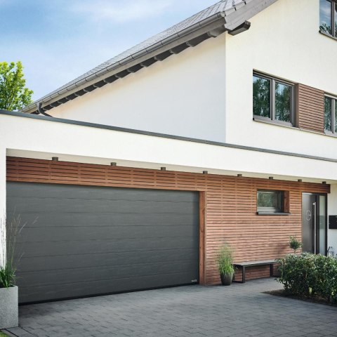Brama garażowa segmentowa Renomatic/Hormann z napędem Supramatic E i szyną FS10-K - przetłoczenia M Woodgrain. Wymiar 5000x2250m Brama garażowa segmentowa Renomatic/Hormann z napędem Supramatic E i szyną FS10-K - przetłoczenia M Woodgrain. Wymiar 5000x2250m